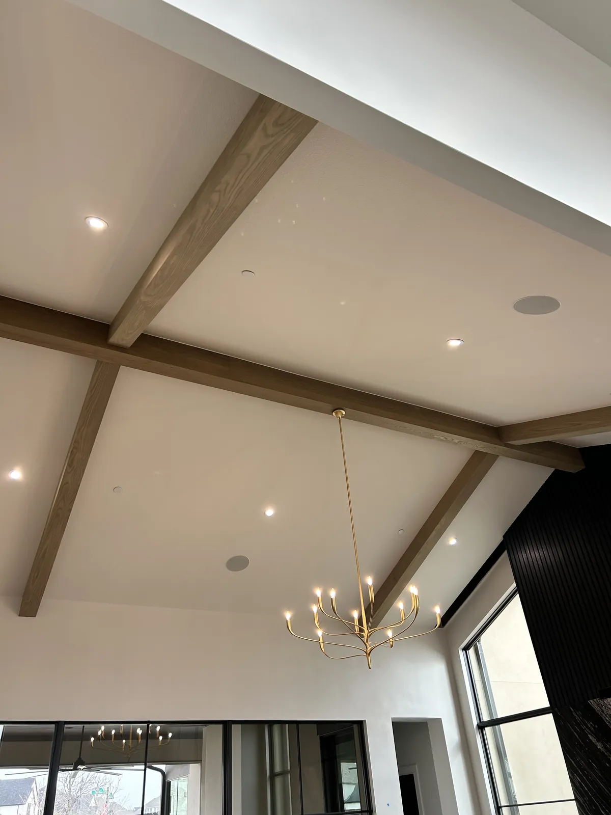Great-room ceiling beams in white oak.